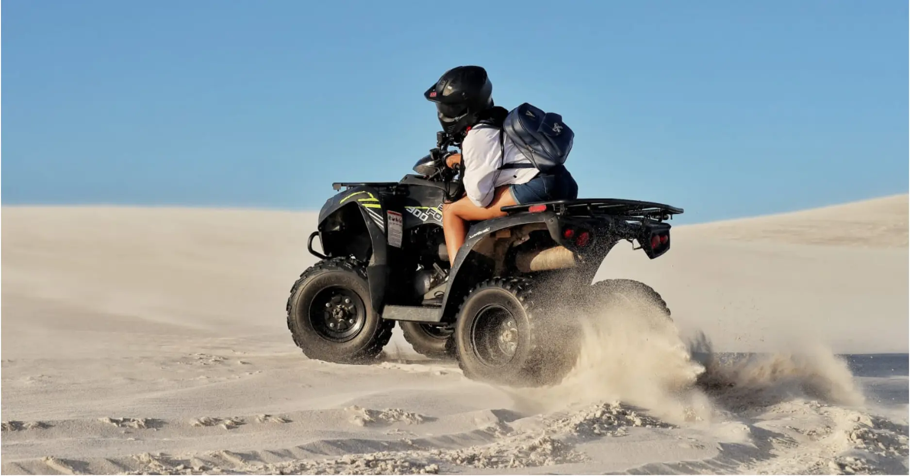 Quad biking Cape Town — riders crossing the Atlantis Dunes on a guided tour